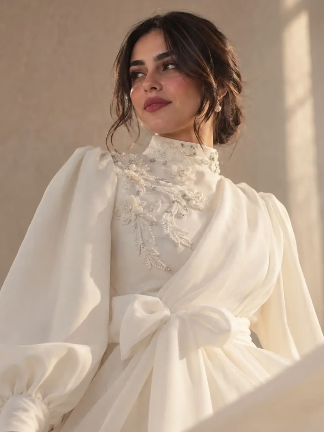Beaded ivory gown, a made-to-measure piece from the atelier
